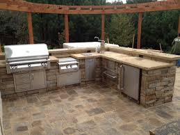 Designing an outdoor kitchen is all about making it fit your needs. Pin By Boyce Design And Contracting On Outdoor Kitchens Diy Outdoor Kitchen Outdoor Kitchen Sink Outdoor Kitchen