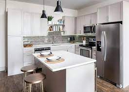 Small L Shaped Kitchen With Island Glass Backsplash Quartz Countertops Simple Kitchen Design Kitchen Design Small Small L Shaped Kitchens