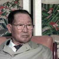 COL Donald Kropp, United Nations Command Secretariat, talks with visitors  at Panmunjom, Republic of Korea, prior to the caravan of 501 cattle and 50  vehicles entering the Communist North Korea, Oct. 27,