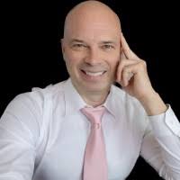 John Daniel, DC, MCA, Broker