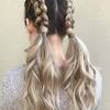 This hairstyle can be achieved by firstly putting your hair in a low ponytail and securing with a hair tie. 1