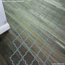 We painted the plywood floor because i was convinced that i could make it look good. Don T Refinish Paint Your Hardwood Floors With Stencils Diy Ideas Royal Design Studio Stencils