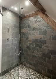 Multicolored stones are also a beautiful choice for stacking into a stone wall. Border Oak Oak Framed Houses Oak Framed Garages And Structures Trendy Bathroom Tiles River Rock Bathroom Slate Bathroom Tile