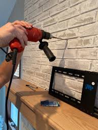 Have an assistant help determine the best mounting location and then. How To Mount A Tv Over A Brick Fireplace Amanda Katherine