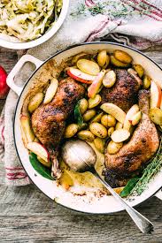 The chicken, potatoes, and asparagus all roast in the oven, though for different lengths of time. Roast Chicken With Potatoes Apples And Brown Cabbage The View From Great Island