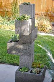 Concrete, or cinder block, is an inexpensive building material for the garden. Cinder Block Garden Ideas Furniture Planters Walls And Decor