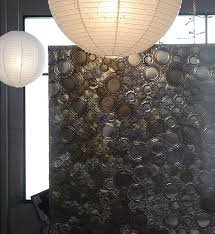 Beautiful Table Top Made Of Tin Cans And Metal Caps Upcycle This Would Look Great On A Mirror As Art Hanging On The Wal Tin Can Tin Can Lights Tin Can