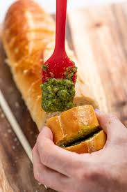 Salsa Verde Garlic Bread Herby And Scalliony Salsa Verde In Sliced Baguette A Delicious And Cheerfully Green Take On Recipes Garlic Bread Recipe Salsa Verde