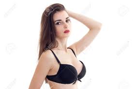 Young Brunette Woman With Red Lips With Big Natural Boobs In Black Bra  Looks At Camera Stock Photo, Picture and Royalty Free Image. Image 80280172.
