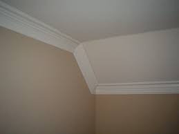 Arch windows are a specialty. Crown Mouldings Installed Detailed Crown Moulding Photos Crown Molding Vaulted Ceiling Ceiling Crown Molding Ceiling Moulding