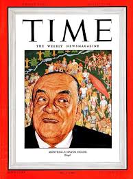 1958 ~ Mayor Leroy Veillon in Centennial costume posing with the granite  monument that sits atop a time capsule placed in city park
