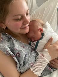 Our Program Supervisor, Martha Lunde, gave birth to a healthy baby boy.  Martha and her son Owen stopped by, and we were so excited to see them.  Kameron, one of the kids