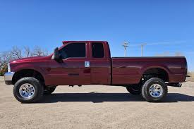 Image result for Dark Toreador Red 2000 F350