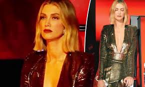 Delta goodrem performs heart hypnotic the voice australia season 2. The Voice Coach Delta Goodrem Goes Braless Beneath A Plunging Gold Mini Dress Daily Mail Online
