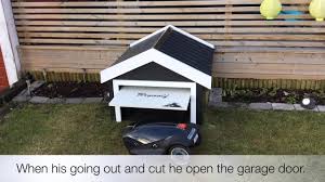 Robotic Mower With Automatic Garage Door Youtube