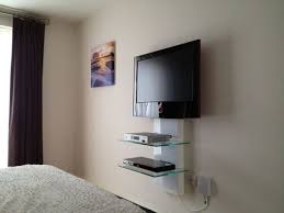 Circle cable clips allow you to secure runs of round cables like coax to walls and floorboards for a cleaner look and prevent tripping over loose. Tv On Wall Shelf Google Search Wall Mounted Tv Wall Mount Tv Shelf Tv Wall Mount Bedroom