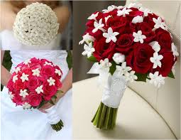 Small white bridal bouquet with calla lilies, lisianthus, cymbidium orchids with a single red rose and a touch of lavender. Wedding Bouquetsg Happilyeverafter13
