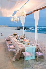 beach wedding diner huwelijk strand dinner tafel bruiloft strand strandhuwelijk trouwjurk strand