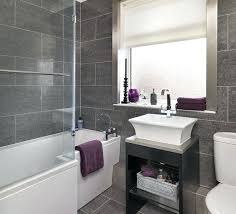 On the outside, the makeshift wooden vanity is a perfect addition to the sink. Grey Bathroom Tile Ideas Whaciendobuenasmigas