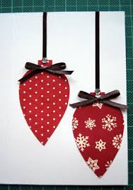Consider making one of these gorgeous paper cuts. Handmade Christmas Card Ideas