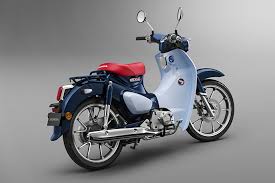 Running in support of the british touring car championship. Honda Global Super Cub C125