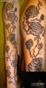 Roses are known for their beauty and because this classic flower represents a duality, with the softness of the bud and harshness of the thorns, your traditional rose tattoo can symbolize two. Tattoo Of Arm Roses Thorns