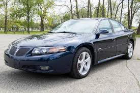 Image result for Arrival Blue 2004 Pontiac