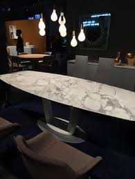 The Calligaris Orbital Dining Table Originally Designed By The Famous Pininfarina Finds New Expression This Year Wit Dinning Table Marble Dinning Table Table