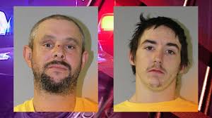 Deputies arrest two men in murder investigation
