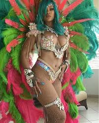 Why now is the time to go bright. Island Gyal Rihanna Looks At A Carnival In Barbados With Blue Hair