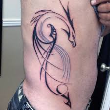 Dragon has been depicted in a lot of different ways in different cultures symbolizing different things. 60 Tribal Dragon Tattoo Designs For Men Mythological Ink Ideas