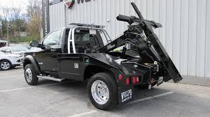 Keywords, trucks for sale near me, pick up truck for sale near me, rack truck, rack body, utility body, work trucks, liftgate, lift gate truck, work trucks for sale, flat deck, dump truck, roll back. 4 Different Types Of Tow Trucks And Car Carriers To Purchase West End