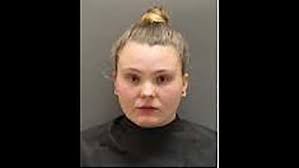 Woman charged after hitting husband with pickup, dragging him several  blocks to his death