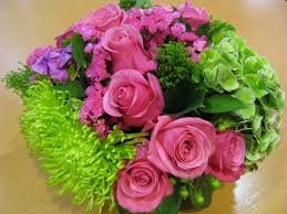 Green viburnum and pink veronica bring texture to the design while a pop of long lasting alstroemeria helps fill in empty spaces. Which Flowers Would Be Best For A Ladies Luncheon First Come Flowers