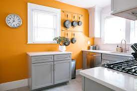 A First Time Home Buyer S Colorful Retro Reno Accent Wall In Kitchen Orange Kitchen Walls Budget Kitchen Remodel