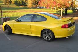 Image result for Yellow 2004 Pontiac