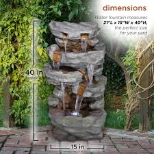 This decorative water fountain measures 24.21\ x 24.21\ x 52.56\ to fit almost any outdoor space. Alpine Corporation 39 In Tall Outdoor Cascading Stone Water Fountain With Led Lights Tzl284 The Home Depot