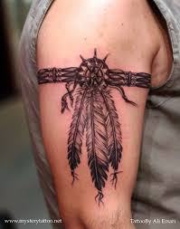 Indian tribal tattoos are usually done using different colored and layered designs. Taino Indian Tattoos The Timeless Style Of Native American Art Indian Feather Tattoos Tattoos Tribal Armband Tattoo