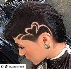 Short half shaved style + bright design. 21 Undercuts For A Hairstyle That S Badass Af Hair Tattoo Designs Undercut Hairstyles Shaved Hair Designs
