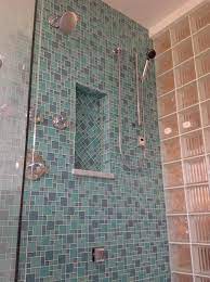 A glass block shower can provide a clean, contemporary look that makes cleaning a breeze. Herringbone Glass Tile Shampoo Niche With Argus Pattern Glass Block Shower Wall Maritim Badezimmer Kolumbus Von Innovate Building Solutions Houzz