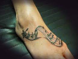 Foot Tattoo Designs For Women Music Note Tattoos On Foot Music Notes Tattoo Music Tattoo Designs Tattoos