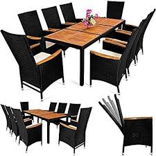 Amazon De Deuba Poly Rattan Sitzgruppe 8 1 Schwarz 7 Cm Dicke Sitzauflagen Tisch Armlehnen Aus Akazienholz Neigbare Ruckenlehnen Wetterbestandige Ghế