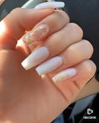 Choice of matte or glossy finish. Milky White Nails With Clear Gold Accent Nail And Small Gold Accents Video Gold Acrylic Nails Gold Accent Nail Formal Nails