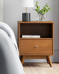 10 Actually Stylish Bedside Tables That Won T Keep You Up At Night Stylish Bedside Tables Modern Nightstand Bedside Table Design