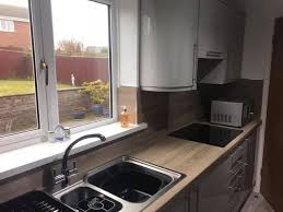 Add a touch of traditionalism by pairing gloss units with wooden worktops.we offer handleless gloss kitchen designs, which is ideal for those who like to add a. Grey Gloss Kitchen With Bardolino Acorn Kitchen Design Facebook