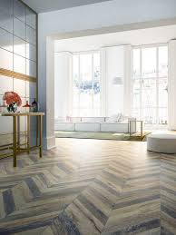 A Unique Series With The Printed Design Of Old Wood In A Chevron Pattern Two Tiles Placed Side By Side Are Needed To Interior Design Flooring Rustic Flooring