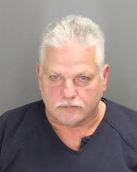 Lake Angelus police chief arrested