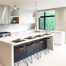 check out the 3 waterfall countertop we did on this island it s centrepiece to anchor ki kitchen modern joining butcher block countertops