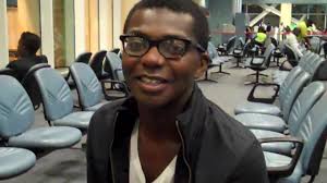 Director Mason Richards waits in a Trinidad airport