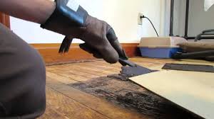 When this oil is blocked from the sunlight it begins to oxidize and can change colors. How To Remove Old Linoleum Tile Youtube